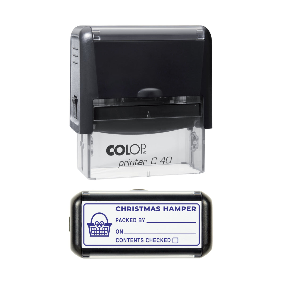 Stamp showing the Christmas Hamper Packed By design, 58 x 22mm COLOP C40 self-inking stamp, violet ink