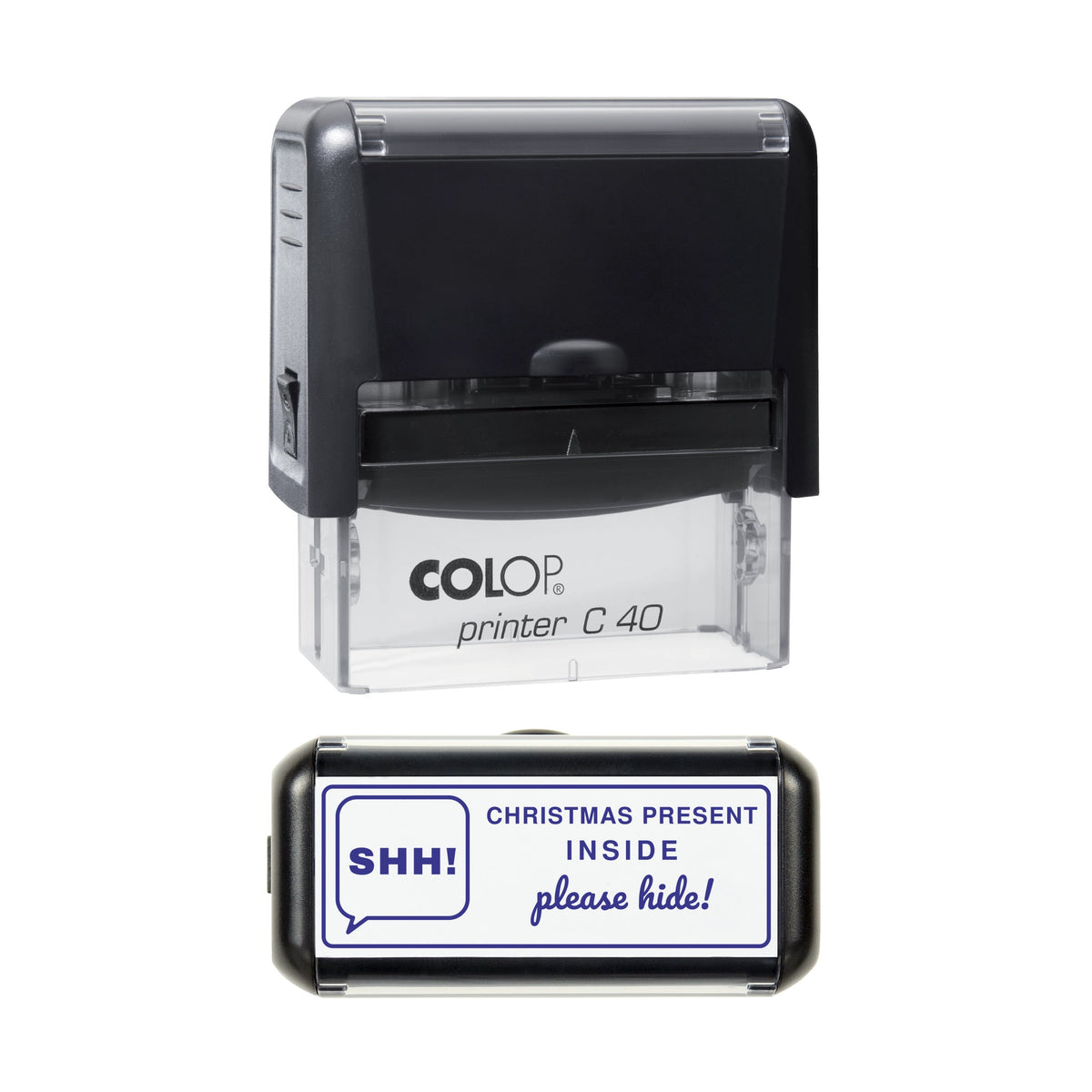Stamp showing the Shh Christmas Present Inside design, 58 x 22mm COLOP C40 self-inking stamp, violet ink